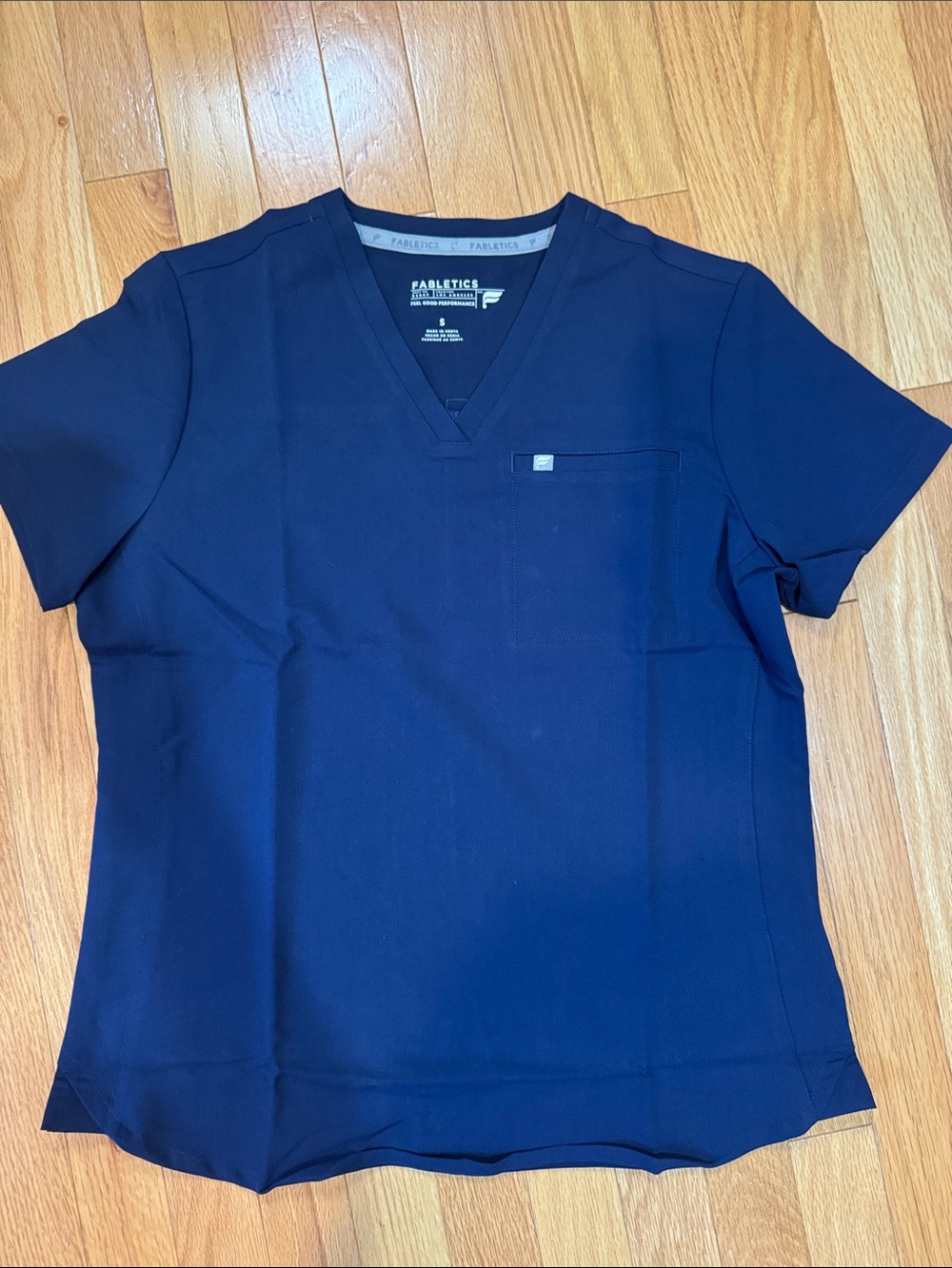 NWOT Fabletics Vital 1 Pocket Scrub Top